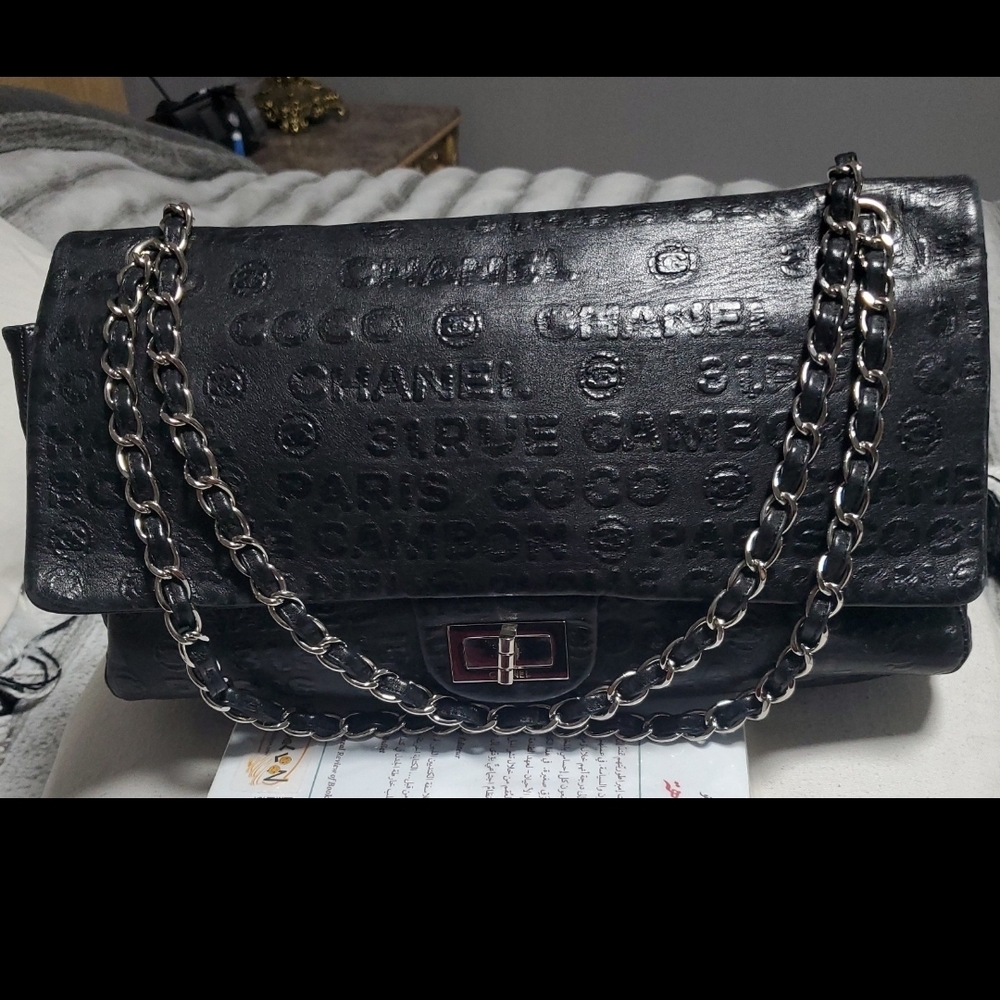 CHANEL Black Embossed Shoulder Bag with Chain